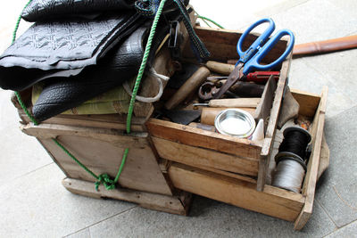 Low section of shoes sitting on wood