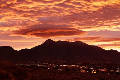 Scenic view of mountains against sky during sunset