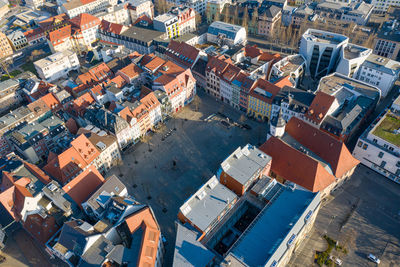 High angle view of buildings and street in city