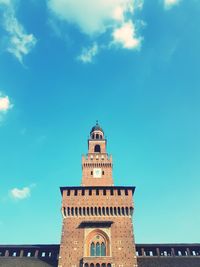 Low angle view of clock tower against sky
