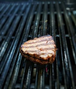 Close-up of meat on barbecue grill