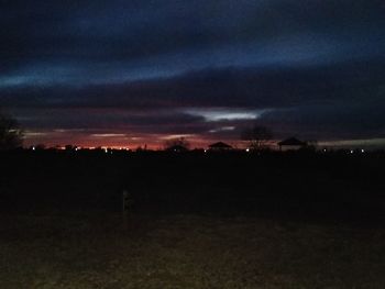 Silhouette landscape against sky during sunset