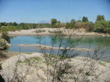 Scenic view of lake against clear sky