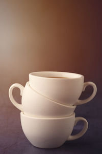 Close-up of coffee cup on table