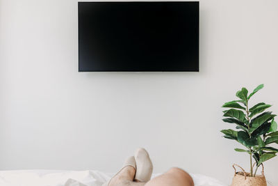 Low section of person relaxing at home