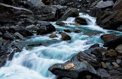 Scenic view of waterfall in forest