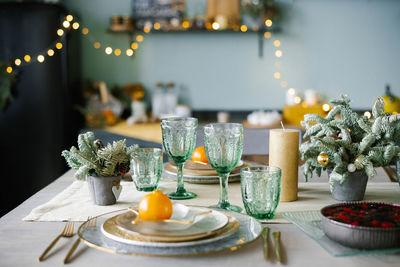 Table served for christmas dinner in living room