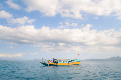 Boat in sea against sky