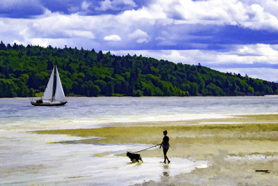 Scenic view of sea against cloudy sky