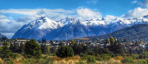 Panoramic shot of townscape against mountain range
