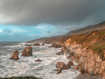Panoramic shot of sea shore against sky