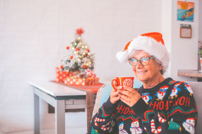 Young woman drinking coffee
