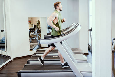 Running at treadmill trying to burn fat and get slim