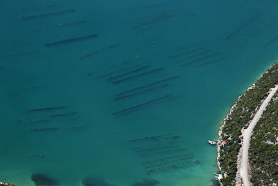 High angle view of sea by building