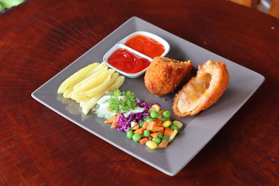 High angle view of meal served on table