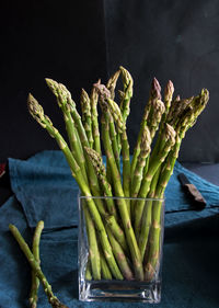 High angle view of vegetables on table against black background