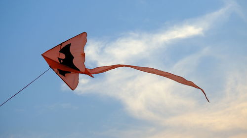 Low angle view of flag against sky