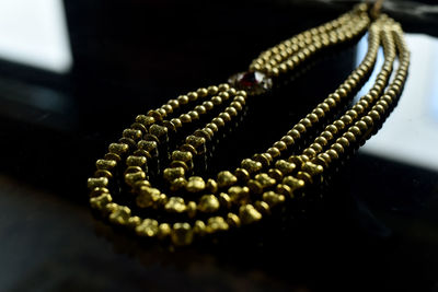 High angle view of necklace on table
