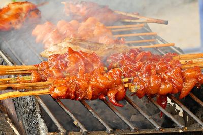 Close-up of meat on barbecue grill