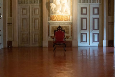 View of an empty chair against building