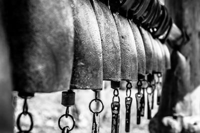 Close-up of clothes hanging on metal
