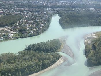 High angle view of river amidst city