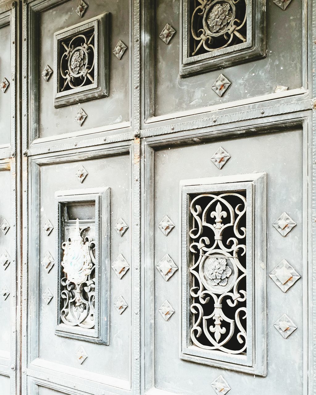 entrance, door, building exterior, architecture, built structure, closed, no people, protection, day, security, safety, building, full frame, pattern, design, backgrounds, knob, doorknob, wood - material, house, outdoors, ornate