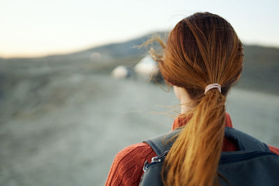 Rear view of woman looking at mountain