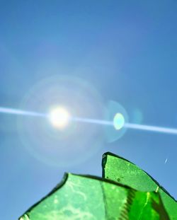 Low angle view of blue sky during sunny day