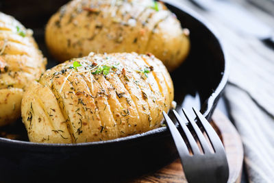 Close-up of prepared potatoes in bowl on table