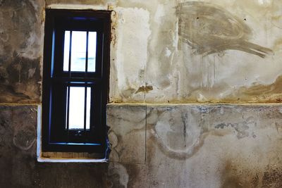 Window of old abandoned building