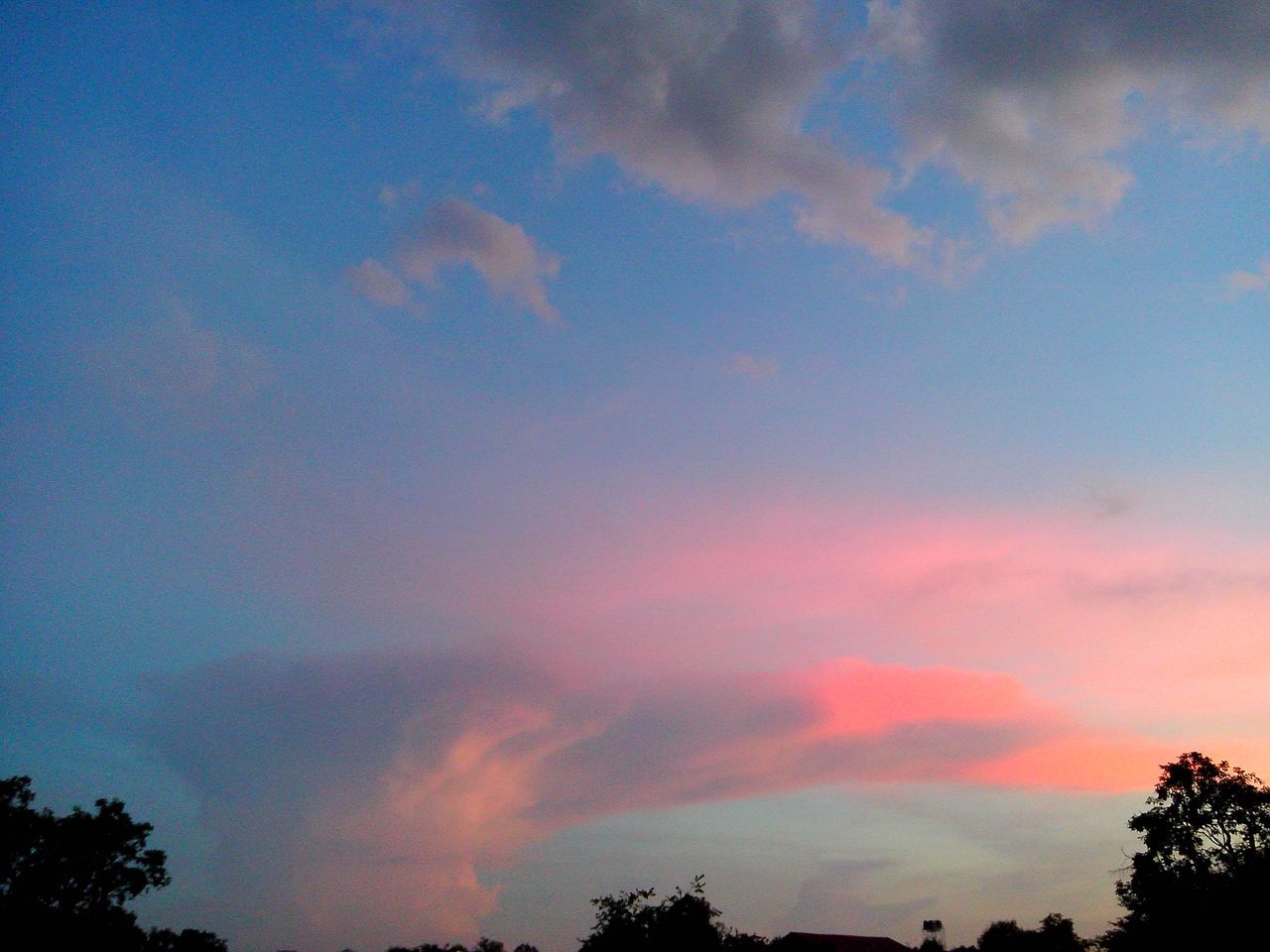 sky, silhouette, sunset, low angle view, tree, beauty in nature, scenics, tranquility, cloud - sky, tranquil scene, nature, idyllic, cloud, orange color, dramatic sky, cloudy, outdoors, no people, dusk, majestic