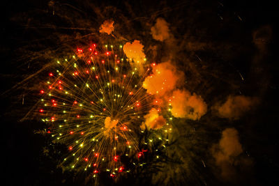 Firework display at night