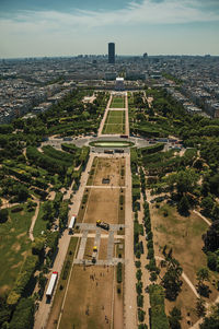 Champ de mars park and cityscape seen from the eiffel tower in paris. the famous capital of france.