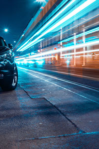 Light trails on city street at night