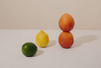 Stacked citrus fruit still life