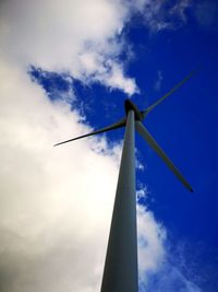 Low angle view of wind turbine against sky