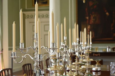 Close-up of candles on the set up table