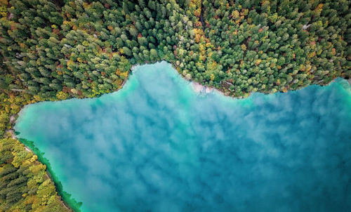 High angle view of sea and land
