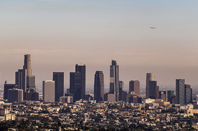 View of buildings against sky during sunset