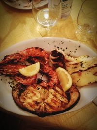 Close-up of food served on table