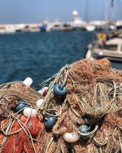 Close-up of fishing net in harbor