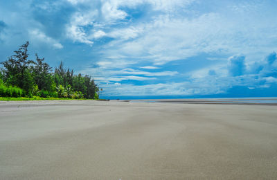 Scenic view of landscape against cloudy sky