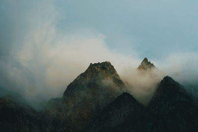 Scenic view of volcanic mountain against sky