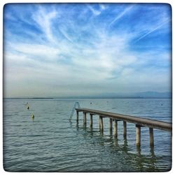 Scenic view of sea against blue sky