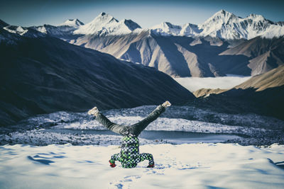 Scenic view of snowcapped mountains during winter