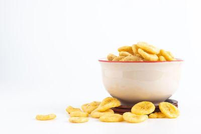 Close-up of burger against white background