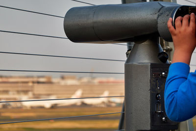 Cropped image of person at observation point