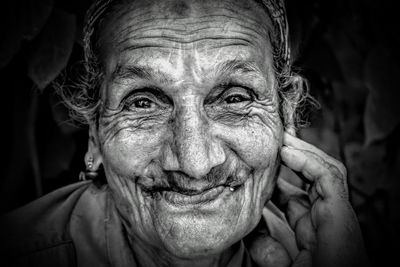 Close-up portrait of smiling senior woman