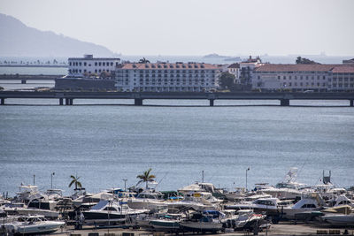 Boats moored at harbor